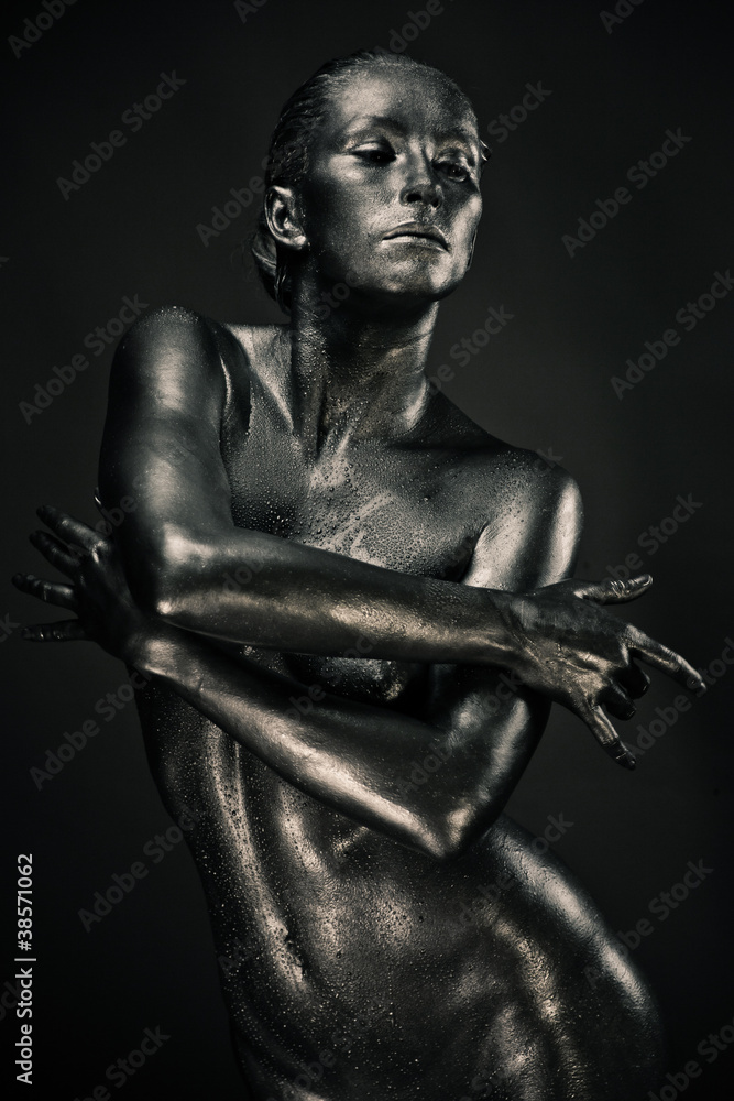 Nude woman like statue in liquid metal Nude woman like statue in liquid metal
