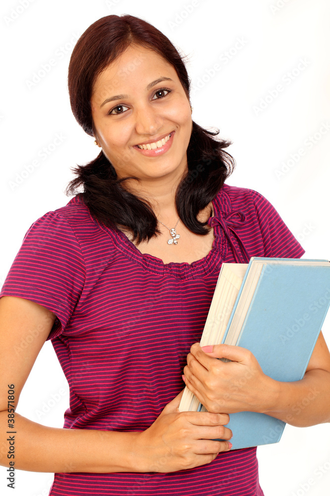 Smiling Indian student against white background Smiling Indian student against white background