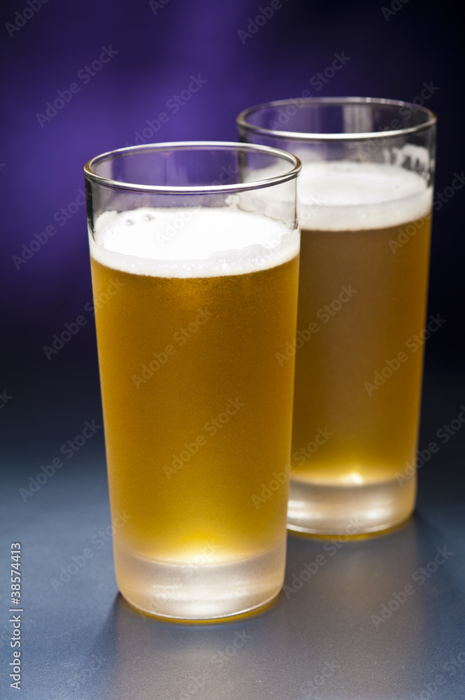 Bier glasses in front of a colorful background Bier glasses in front of a colorful background