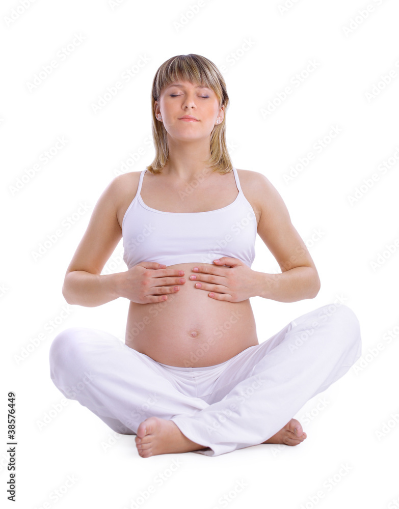 Beautiful pregnant woman touching her lovely belly - isolated Beautiful pregnant woman touching her lovely belly - isolated