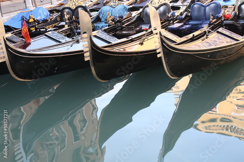 Venetian gondola parked near San Marco square (Venice, Italy) photo