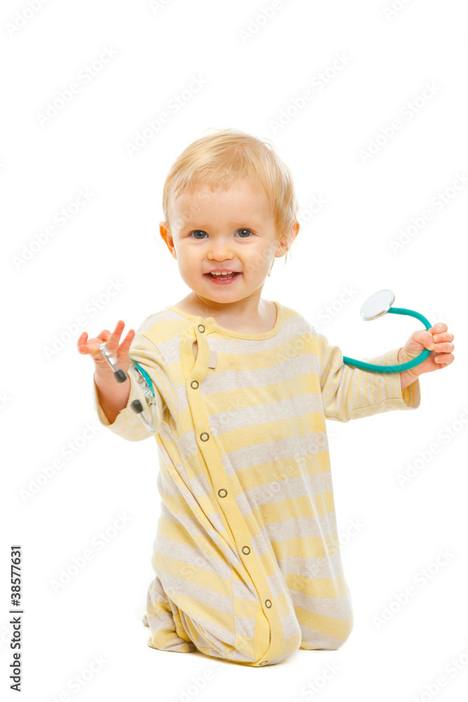 Cute baby playing stethoscope isolated on white Cute baby playing stethoscope isolated on white