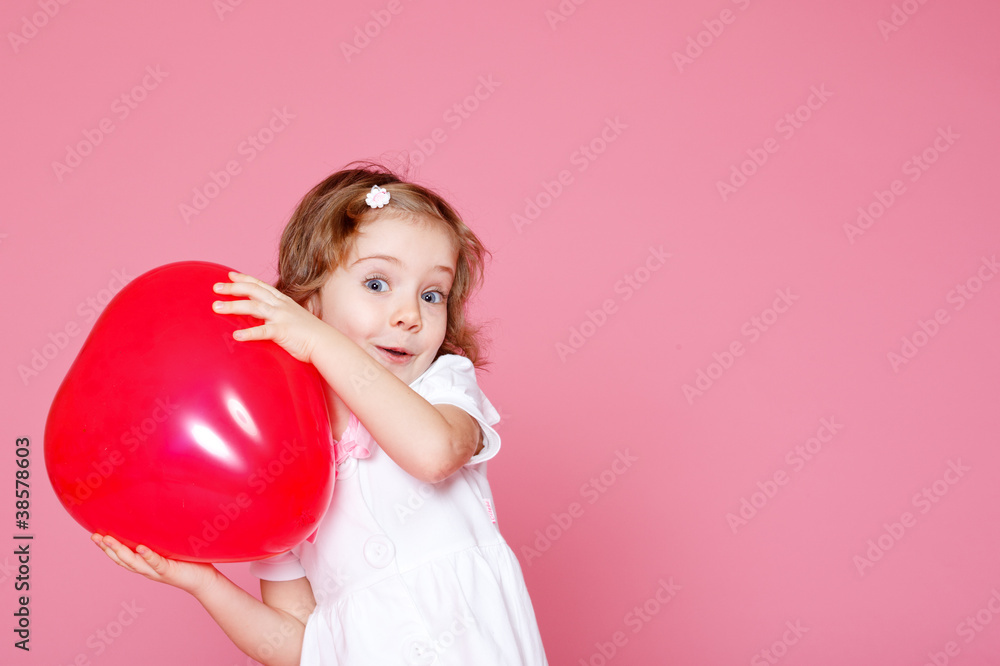 Girl playing with red balloon Girl playing with red balloon