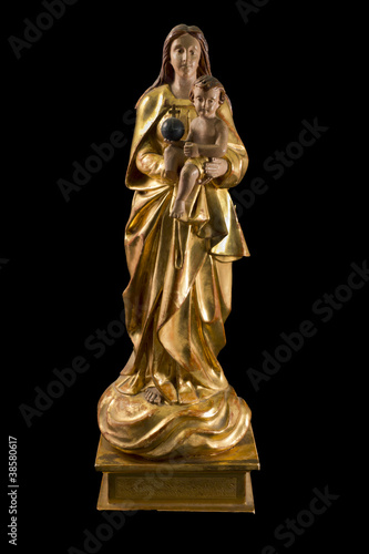 Mary with Jesus, gold antique statue isolated on black