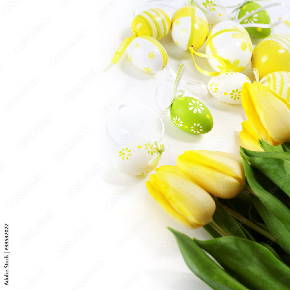 easter eggs with yellow tulip flowers