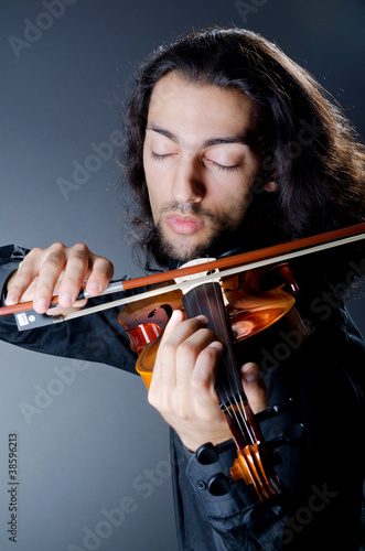 Violin player playing the intstrument