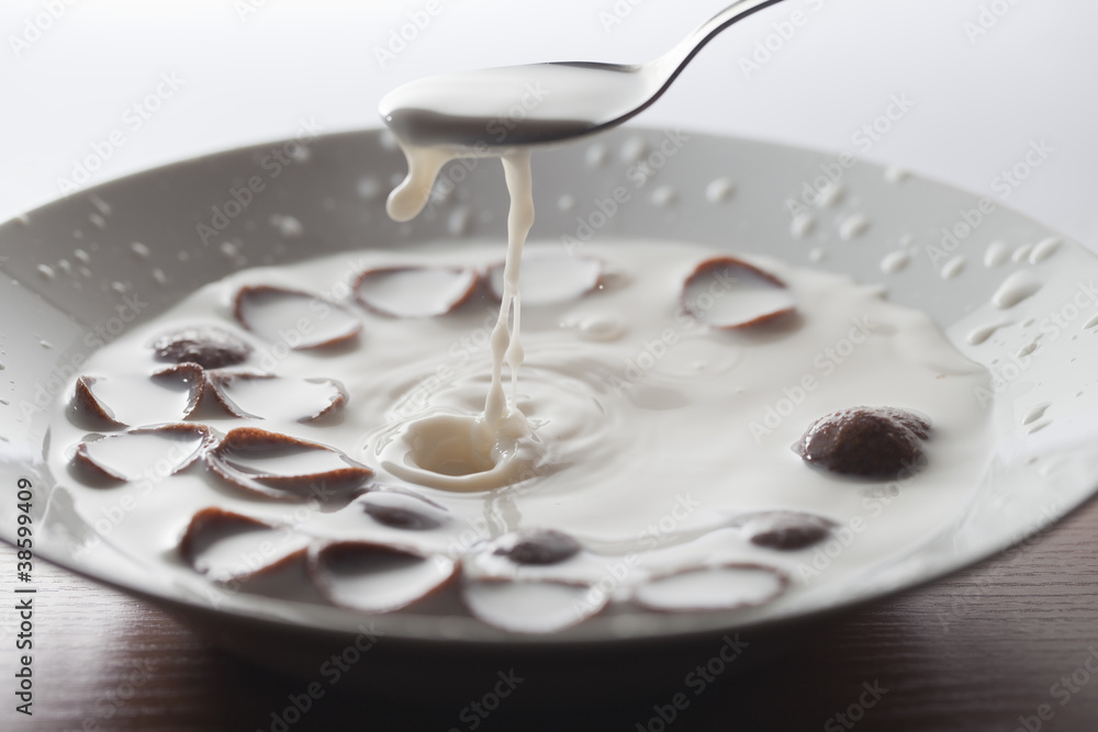 Milk and corn flakes.