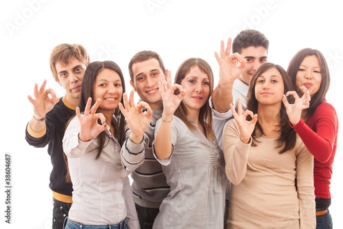 Happy Multiracial Group showing Ok Sign