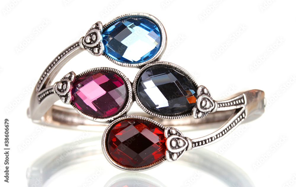 Beautiful silver bracelet with precious stones isolated on white Beautiful silver bracelet with precious stones isolated on white