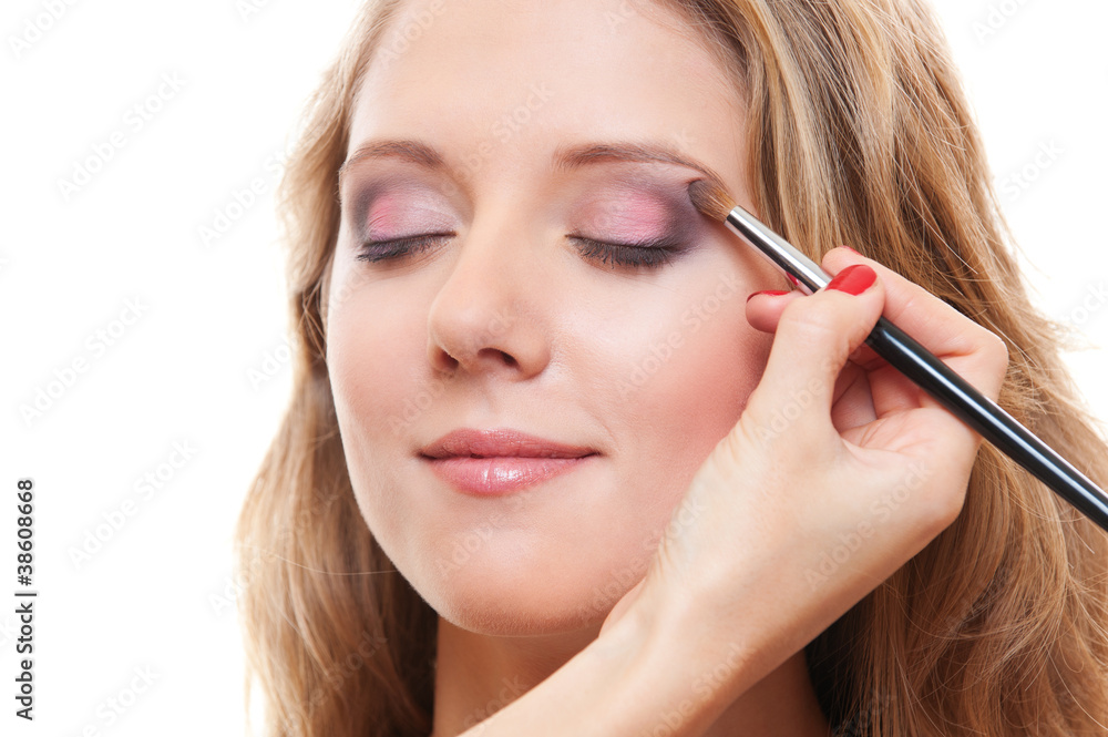 lovely young woman having make up lovely young woman having make up