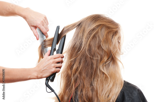 hairdresser straightening hair