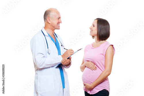 pregnant woman and doctor having conversation