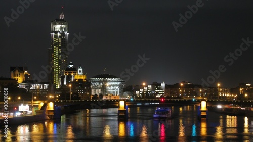 Hotel RedHills (Krasnye Holmy) stand near river behind Bridge photo