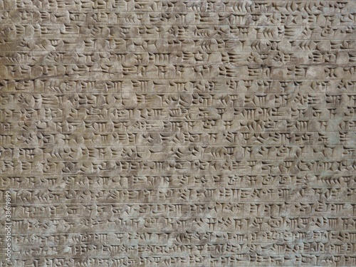 Ancient Assyrian wall carvings of cuneiform writing