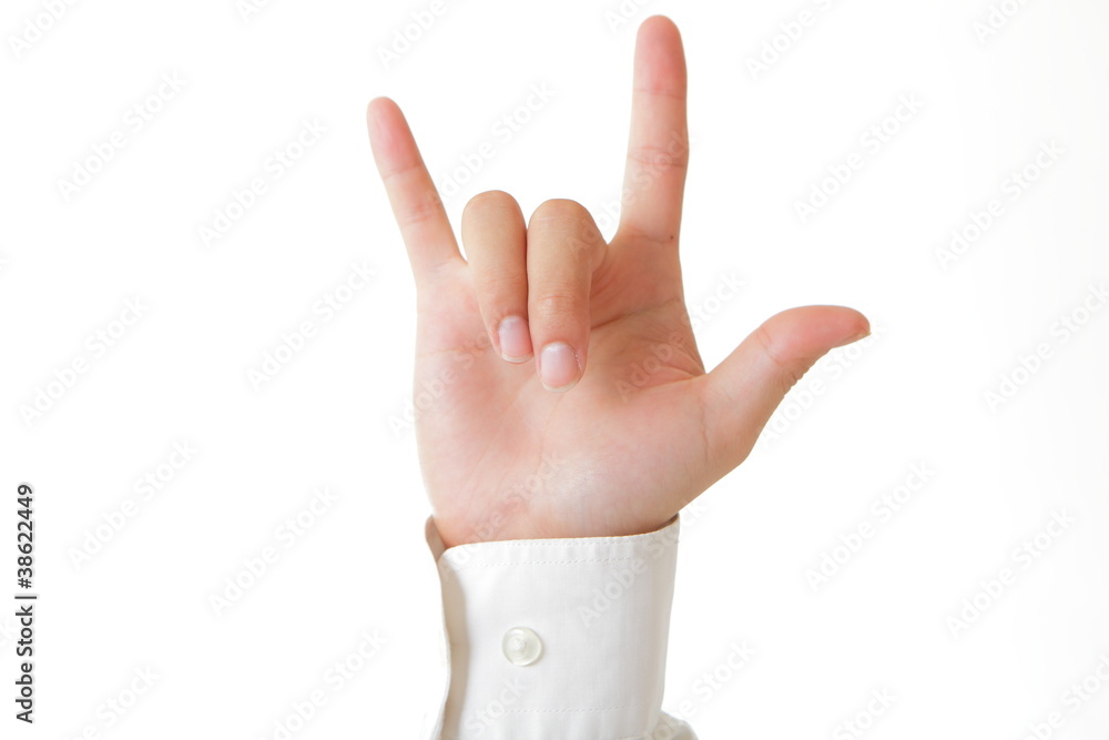 Hand in rock n roll sign with white shirts Hand in rock n roll sign with white shirts