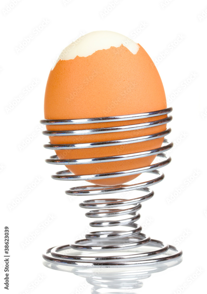 boiled egg in metal stand isolated on white boiled egg in metal stand isolated on white
