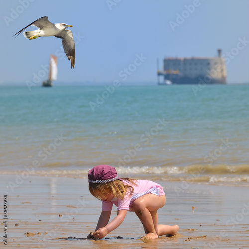 child playing at Island of Oleron - France