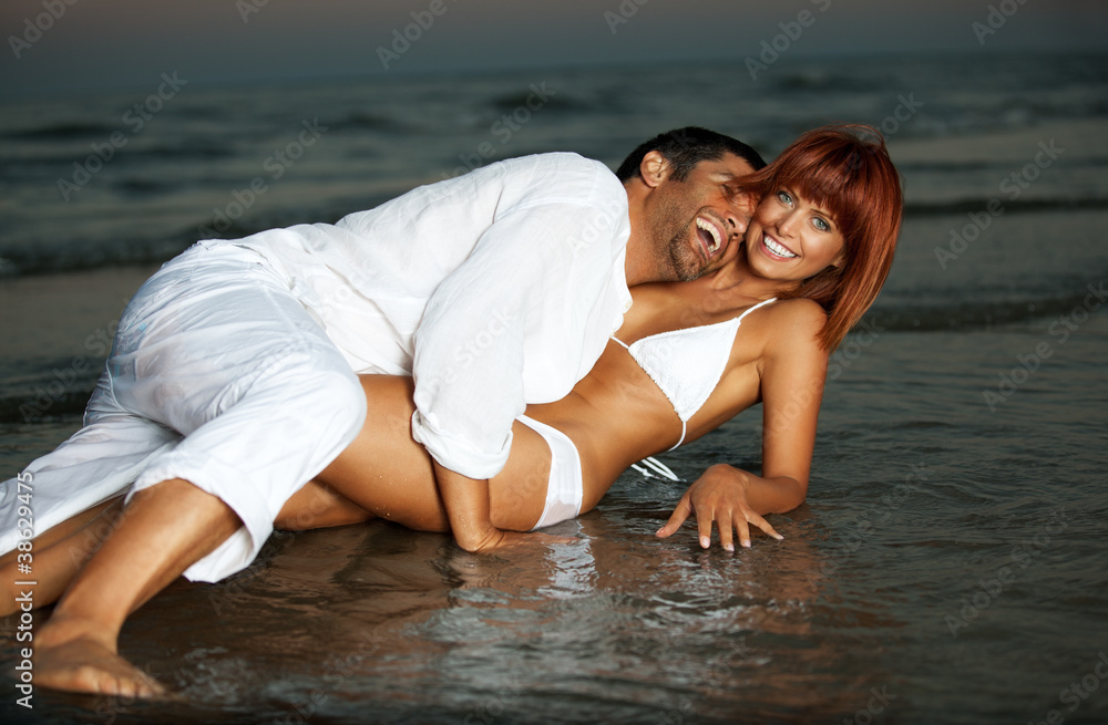 happy, romantic couple, by the sea shore