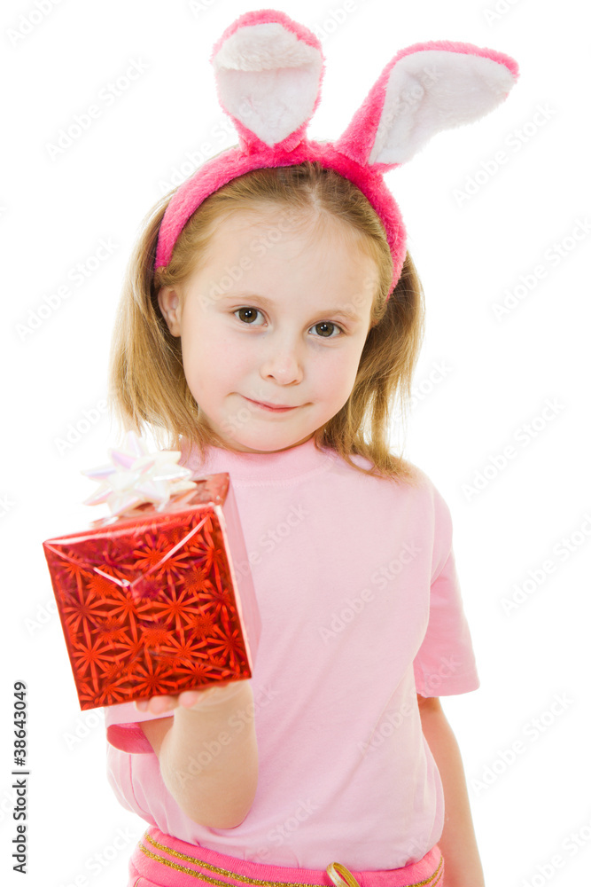 The little girl with pink ears bunny with a gift The little girl with pink ears bunny with a gift