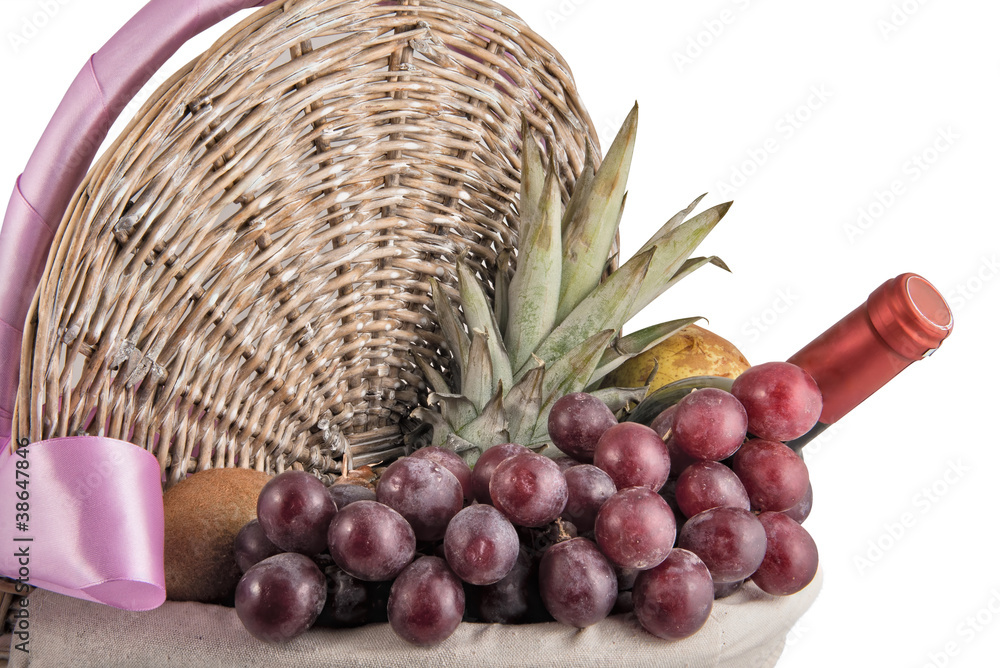 Picnic Basket with Tropical Fruits and Wine Picnic Basket with Tropical Fruits and Wine