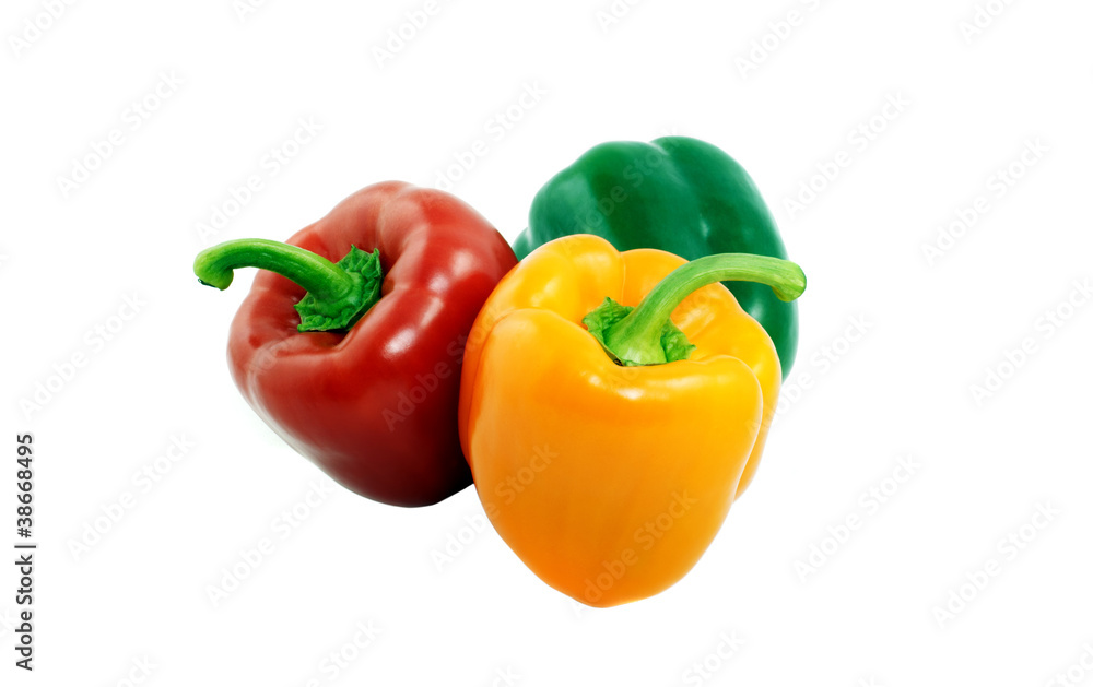 Fresh green, red and yellow paprika isolated on white Fresh green, red and yellow paprika isolated on white