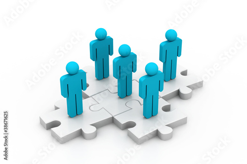 People are standing on pieces of jigsaw puzzle.