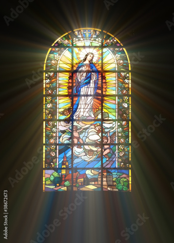 Biblical stained glass with rays of light shining through