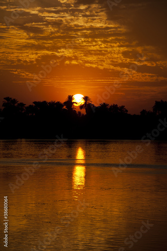 Sunset over a large river