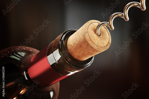 Foto Uncorking of a wine bottle