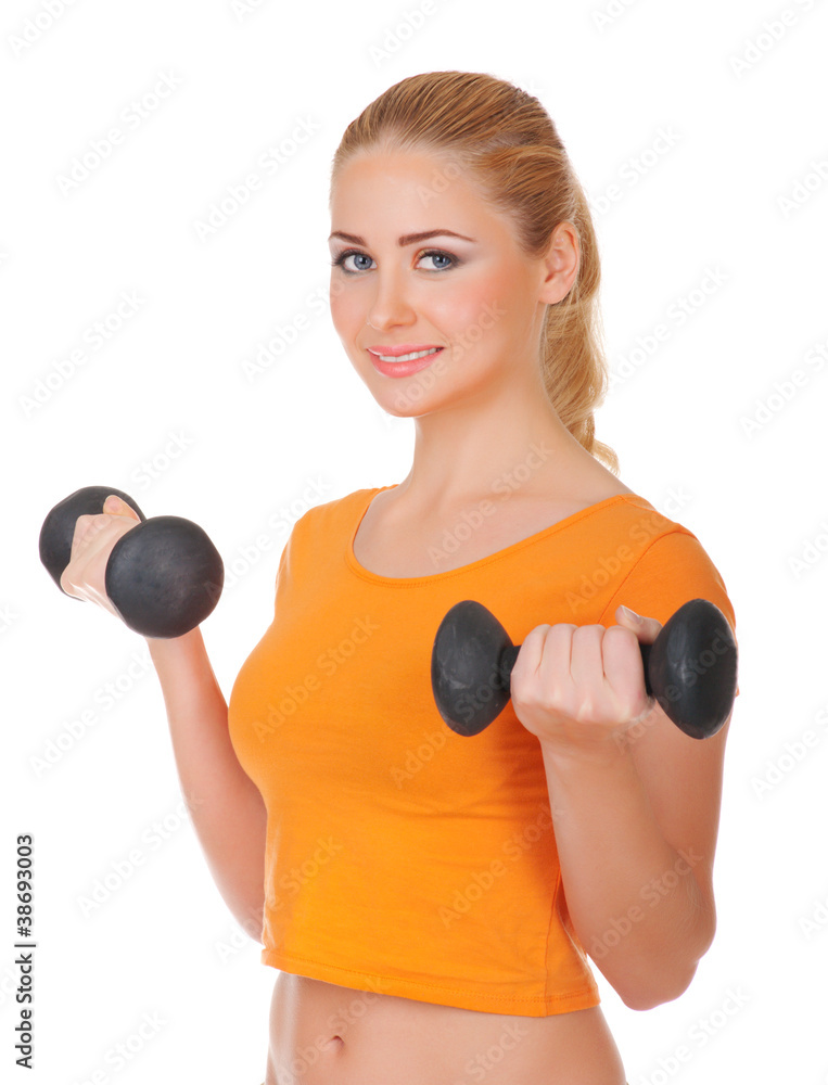 Young woman with dumbbells