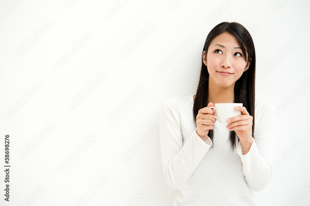 attractive asian woman relaxing in the white room attractive asian woman relaxing in the white room