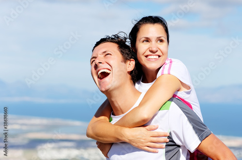 joyful couple laughing