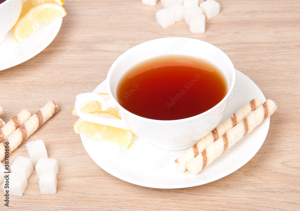 Tea with lemon and cookie Tea with lemon and cookie