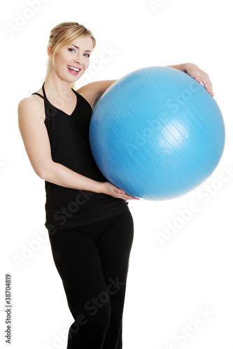 Young girl with fit ball