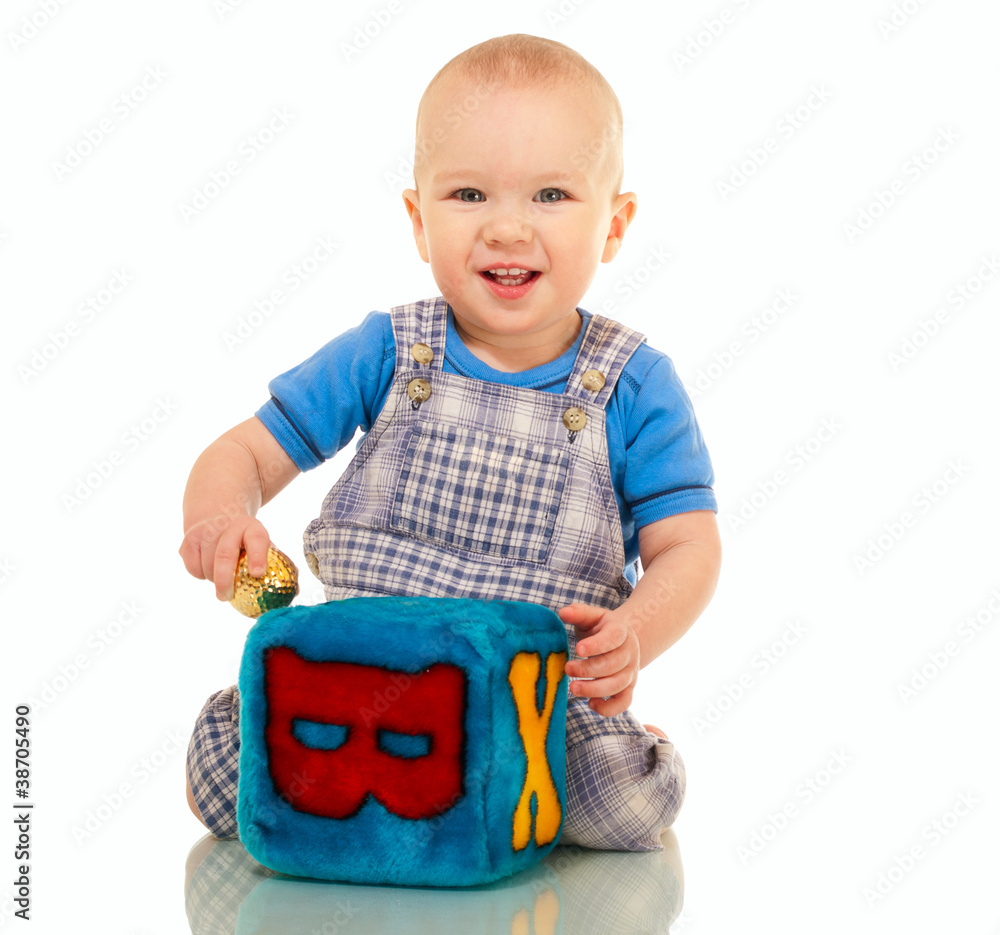 Happy little boy in overall