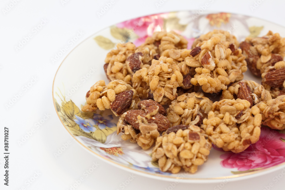 Roasted almonds, granola and a touch of honey Roasted almonds, granola and a touch of honey