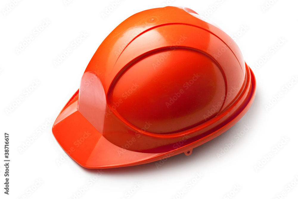 Fototapeta premium Red safety helmet on white