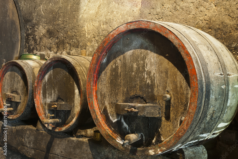 Three old wine barrels