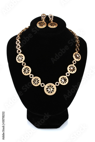 beautiful gold necklace with diamond and earrings