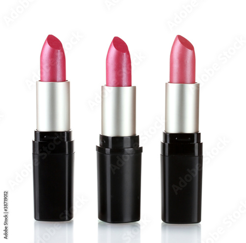 Different lipsticks isolated on white background