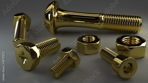 gold bolts and nuts still life