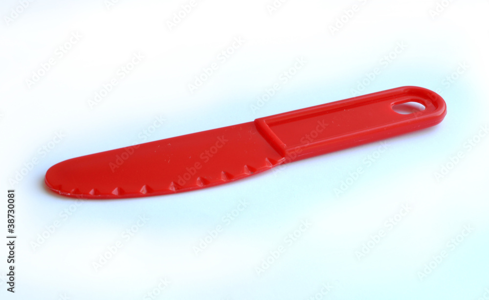 Toy knife on a white background Toy knife on a white background
