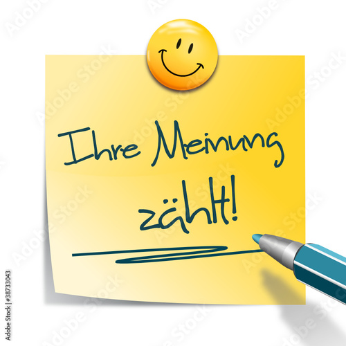 Notizzettel mit Stift und Smiley