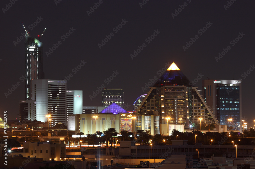 Fototapeta premium WAFI Mall in Dubai City illuminated at night