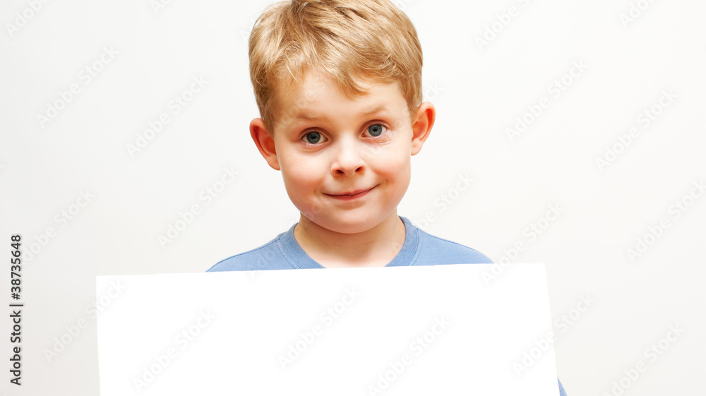 boy holding sign boy holding sign