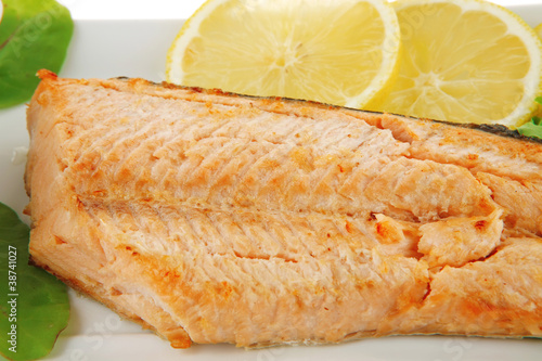 grilled salmon steak on white