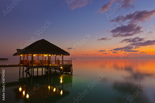 Water cafe at sunset - Maldives © Nikolai Sorokin