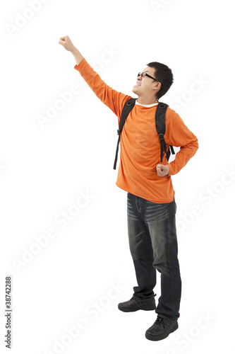Portrait of an excited young man with hand raised