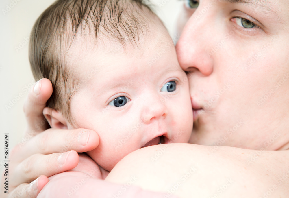 Portrait newborn baby in father hands Portrait newborn baby in father hands