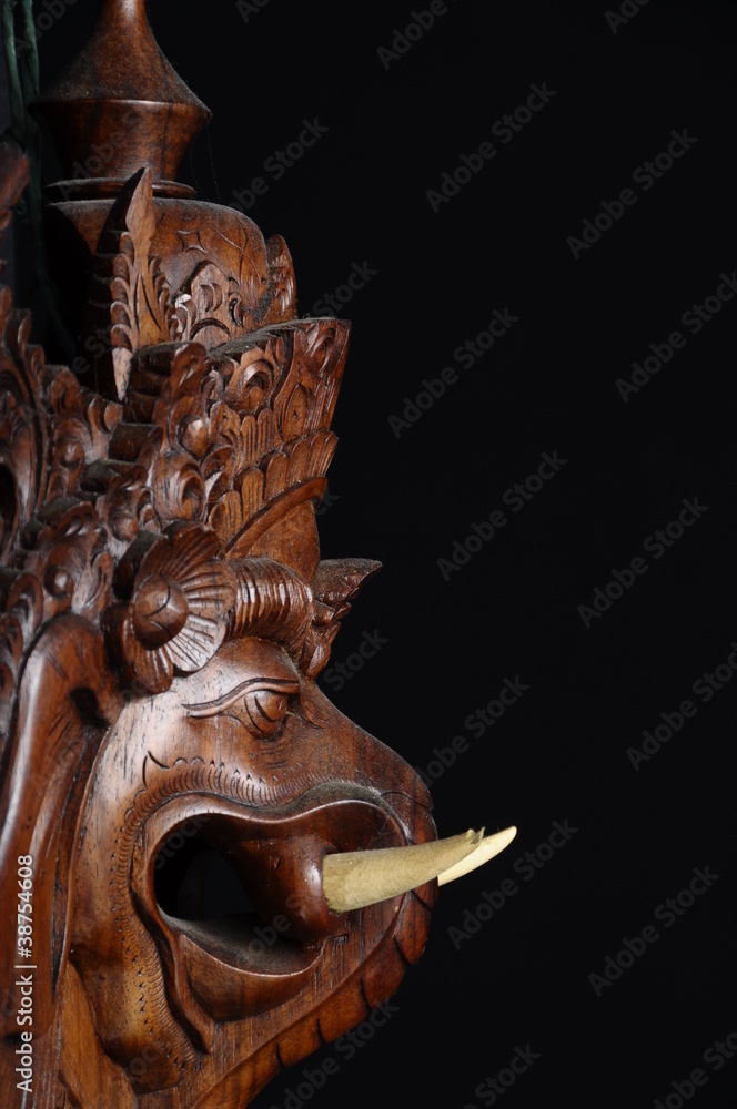 Profile view of an indonesian wooden mask Profile view of an indonesian wooden mask